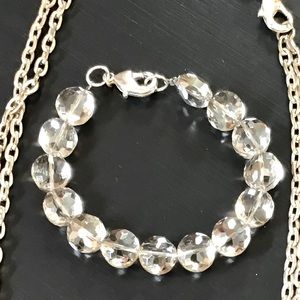 Silver necklace that also converts to a necklace and matching bracelet